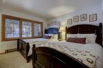 Second guest bedroom with two queen beds 